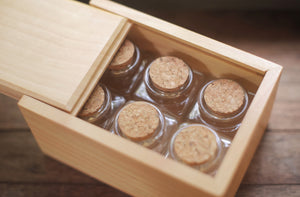 Large Wooden Box with Bottles